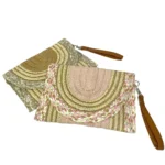 Cartera de mano artesanal con tejido de diseño étnico a sido agregado a favoritos